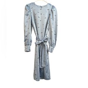 H&M baby blue and black dress in a size 6, hits right below the knees.